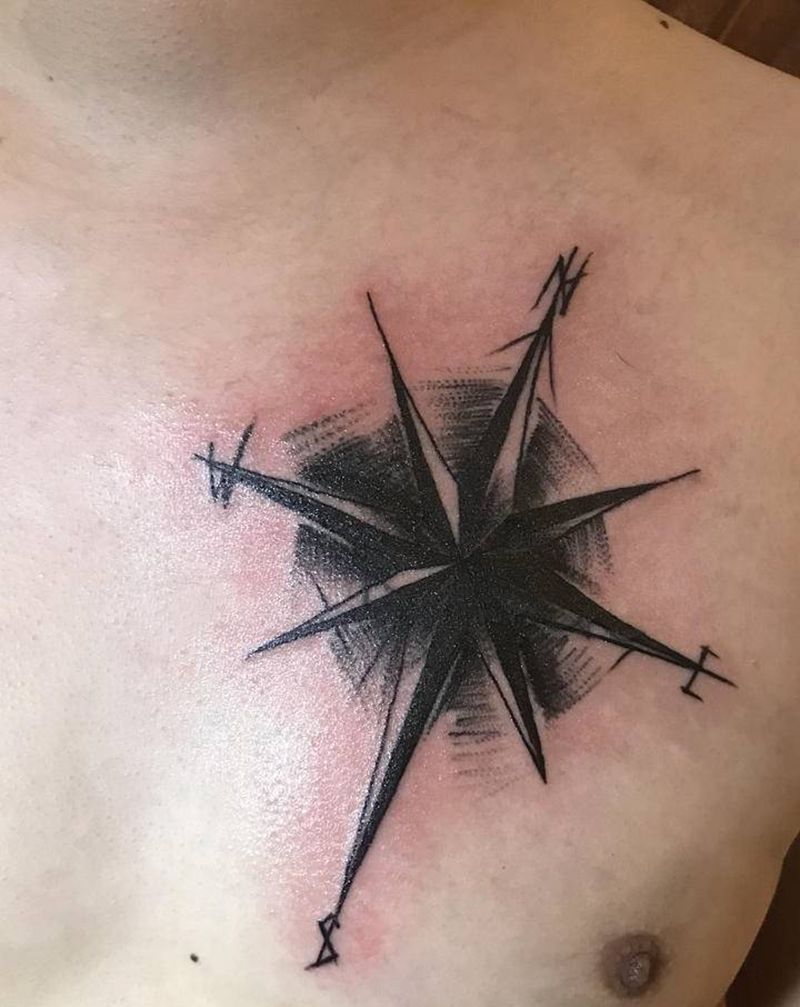 指南针遮盖纹身图片_胸部几何纹身图案