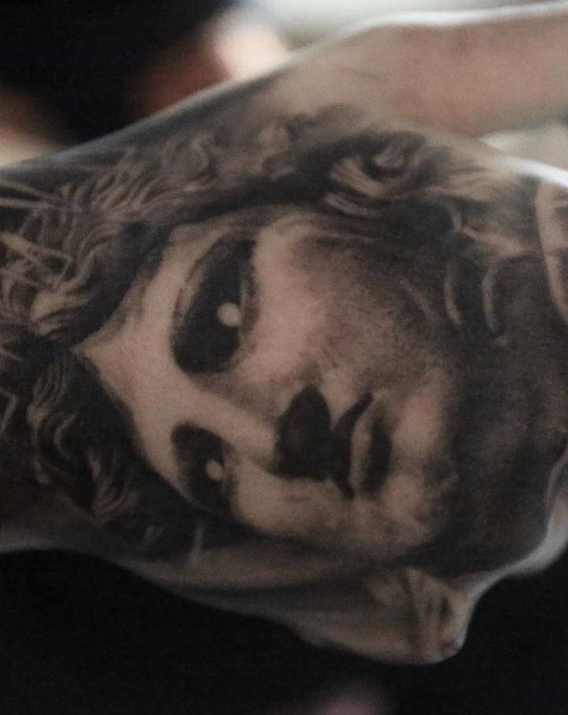 阿波罗纹身图片_手臂纹身图案