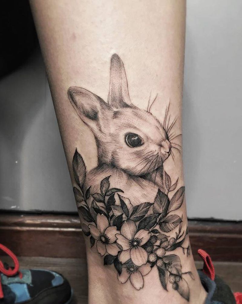兔子，客人带图纹身图片_脚部腿部欧美写实点刺纹身图案