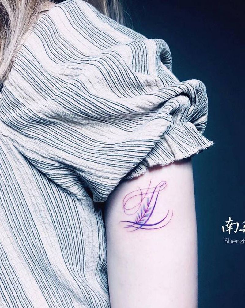 LL纹身图片_手臂水彩New School纹身图案