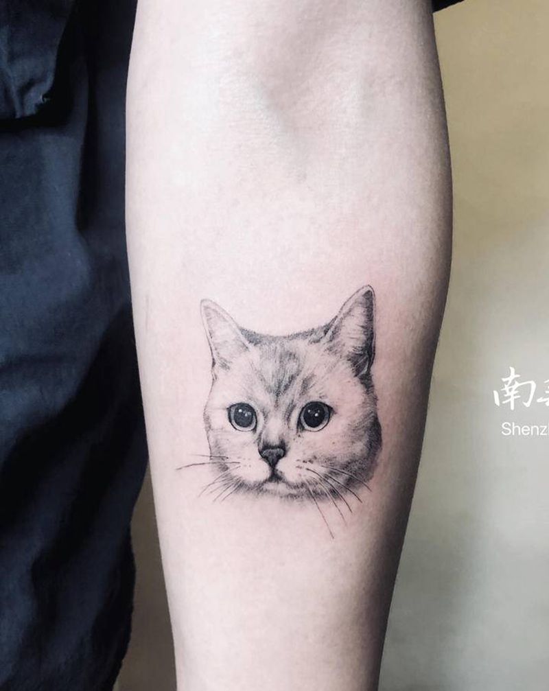 小猫咪纹身图片_手臂欧美写实纹身图案