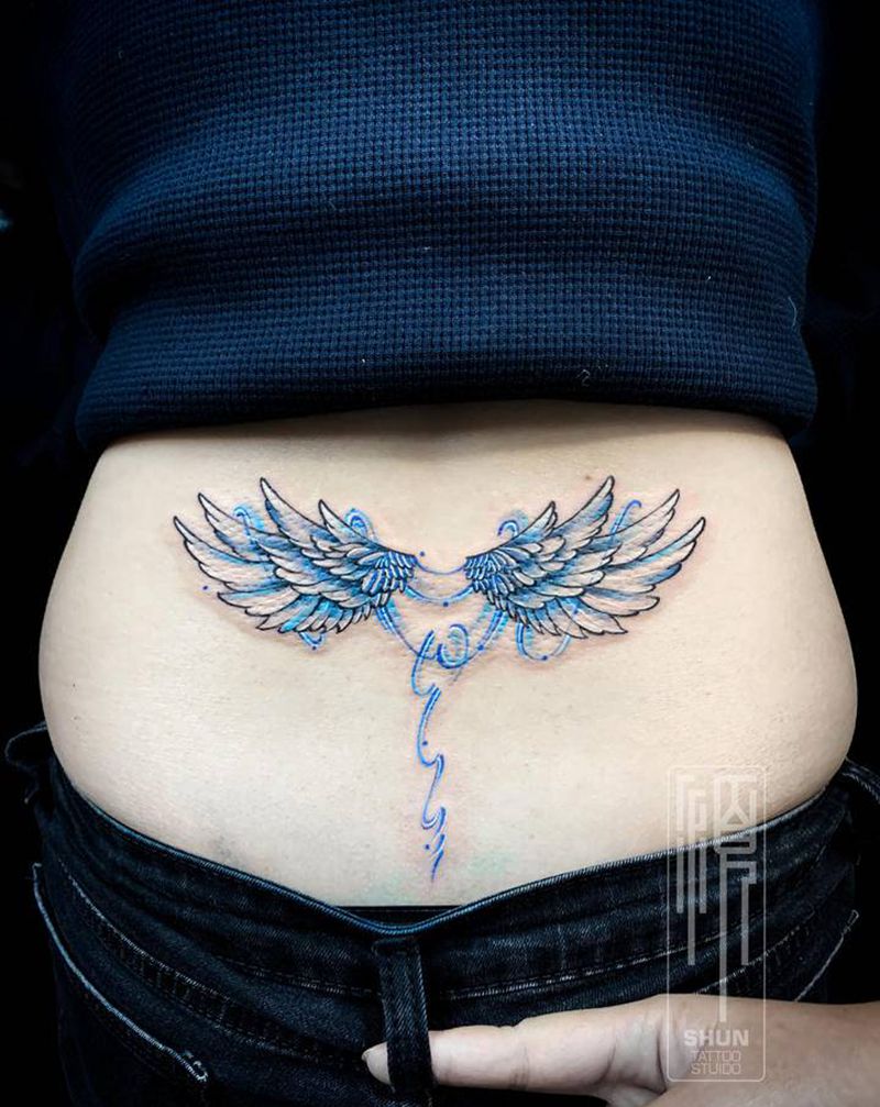 翅膀纹身图片_腰部水彩纹身图案
