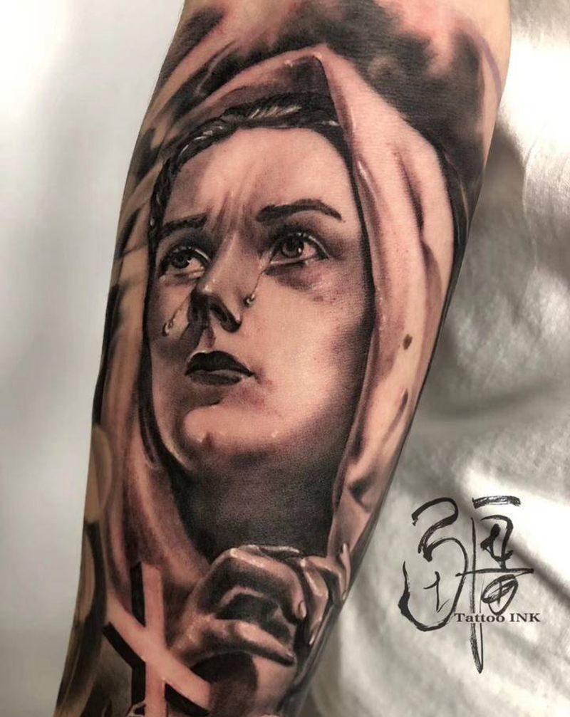 圣母纹身图片_手臂手部欧美写实圣母纹身图案