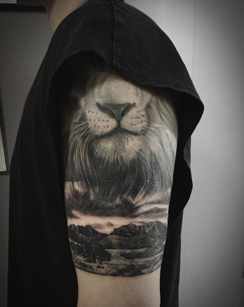 遮盖未完纹身图片_手臂欧美写实纹身图案