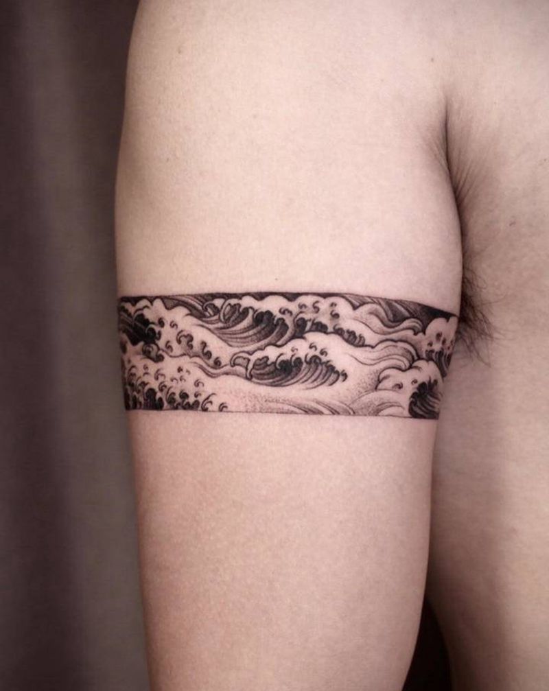 水浪纹身图片_手臂点刺新传统纹身图案