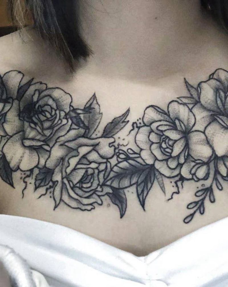 素花纹身图片_胸部纹身图案