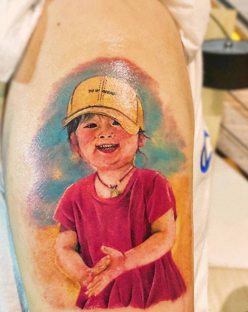 彩色写实小照片儿r纹身图片_手臂欧美写实纹身图案