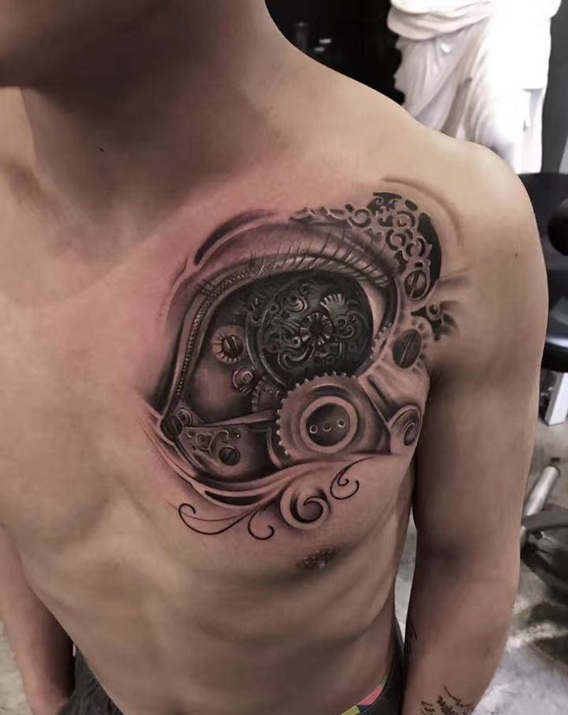 机械眼纹身图片_胸部欧美写实纹身图案