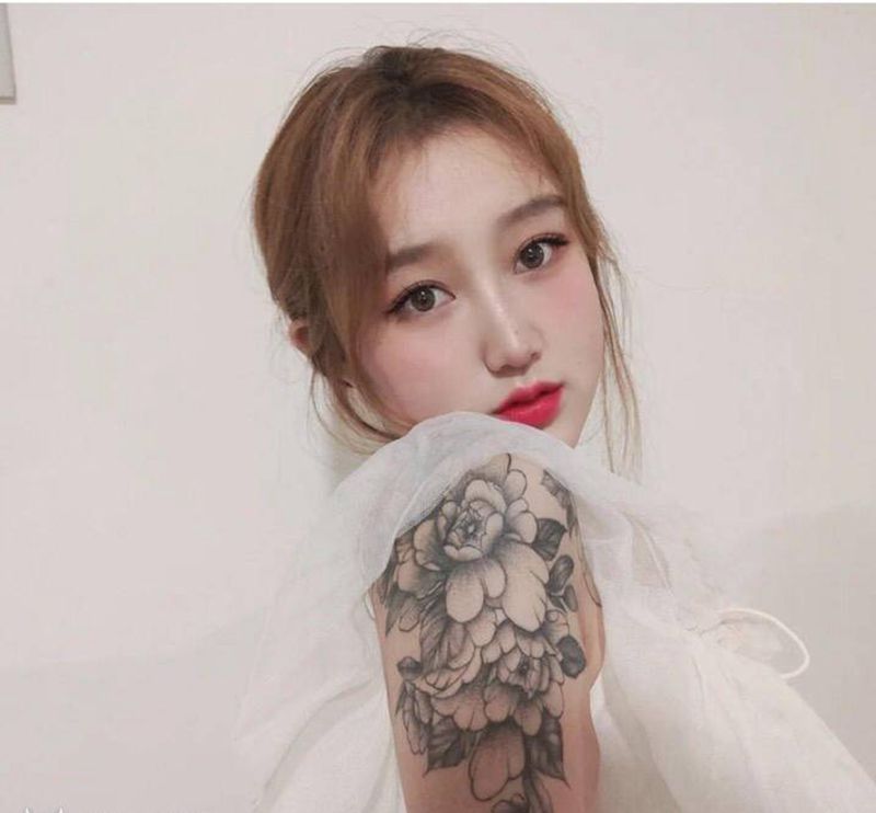 素花纹身图片_手臂纹身图案