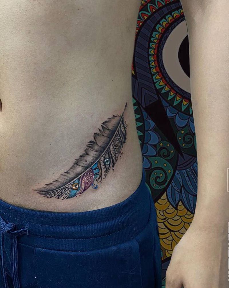 羽毛纹身图片_腰部纹身图案