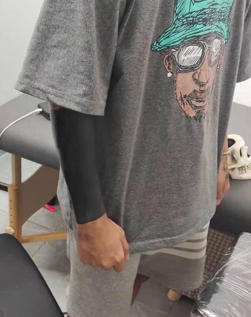 黑臂纹身图片_手臂纹身图案