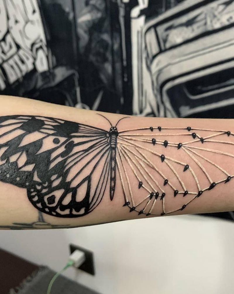 蝴蝶纹身图片_手臂欧美写实几何纹身图案