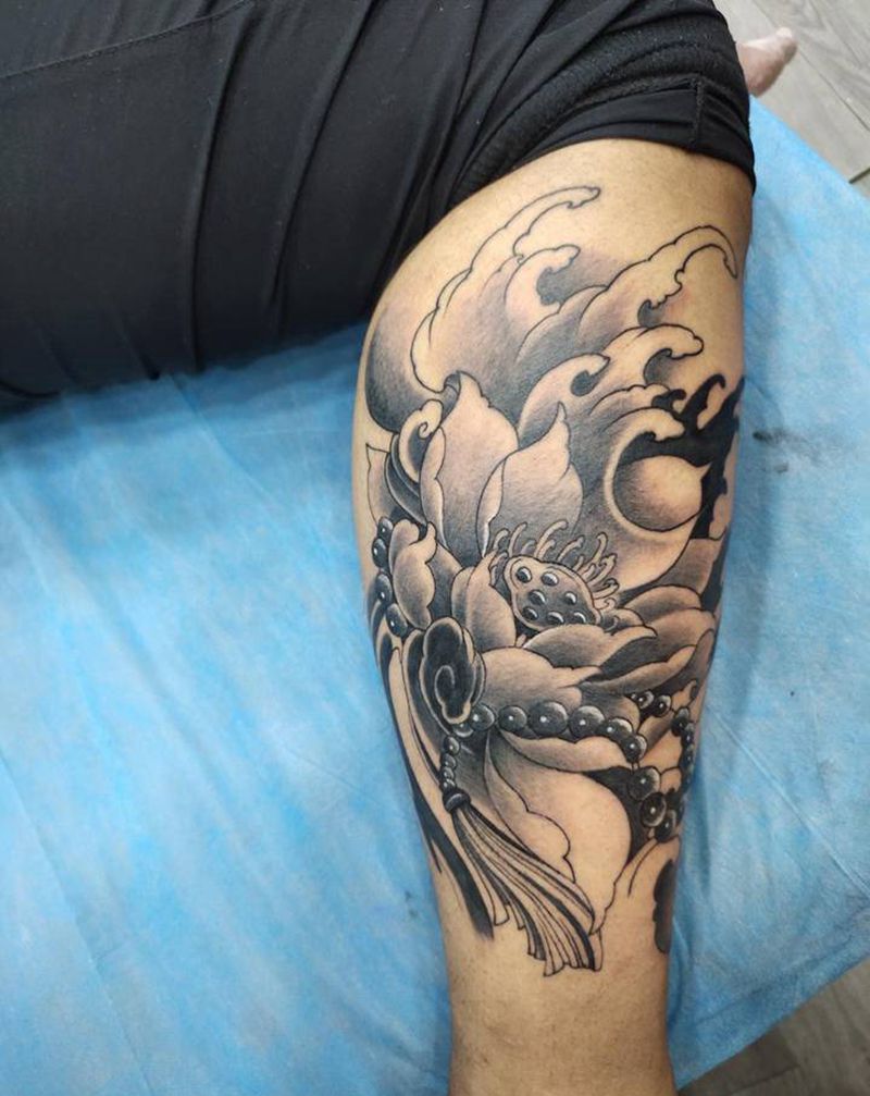 莲纹身图片_腿部纹身图案