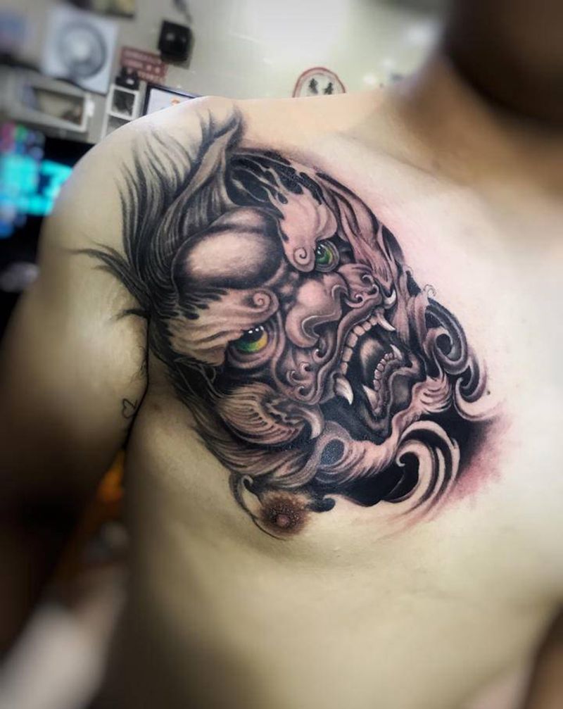 唐狮纹身图片_胸部纹身图案