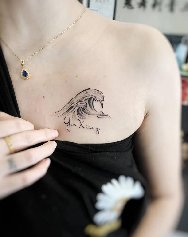 情侣款纹身图片_胸部纹身图案