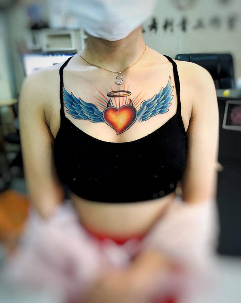心飞翔、透心凉纹身图片_胸部纹身图案