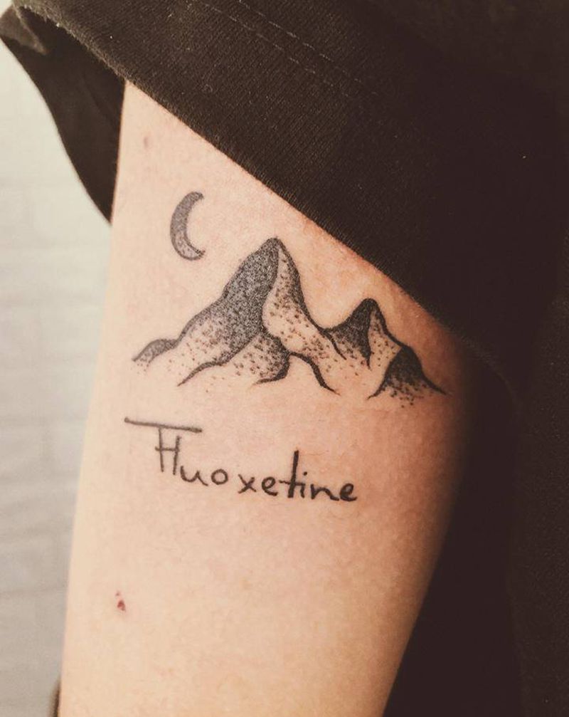 那些人生的山峰纹身图片_手臂点刺纹身图案