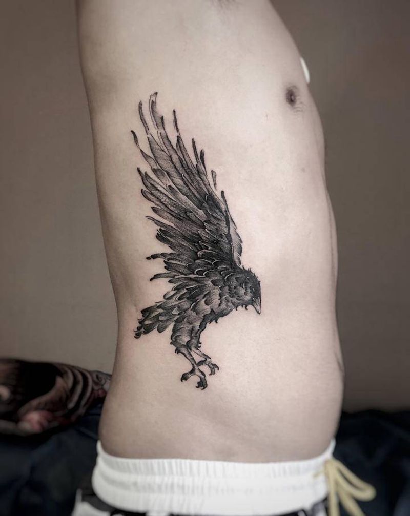 乌鸦纹身图片_腰部点刺几何纹身图案