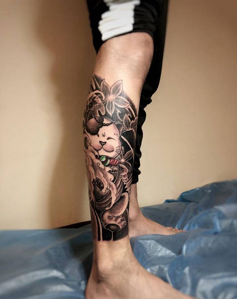 招财猫纹身图片_腿部新传统纹身图案