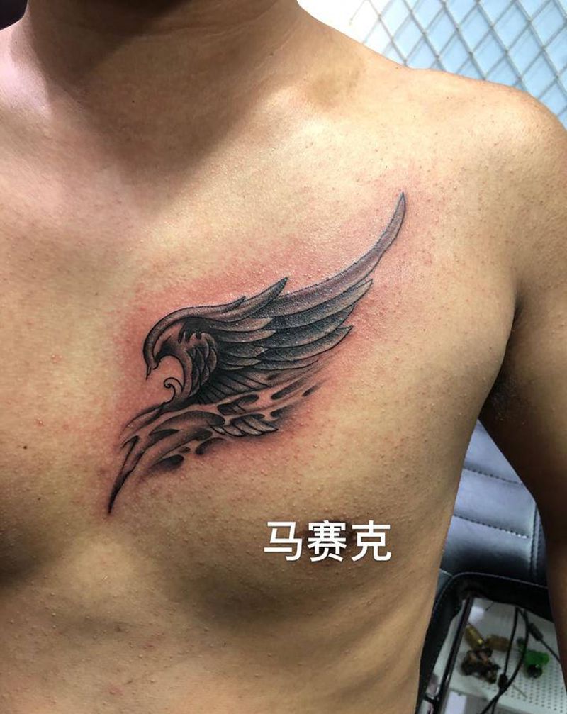 翅膀遮盖纹身图片_胸部纹身图案
