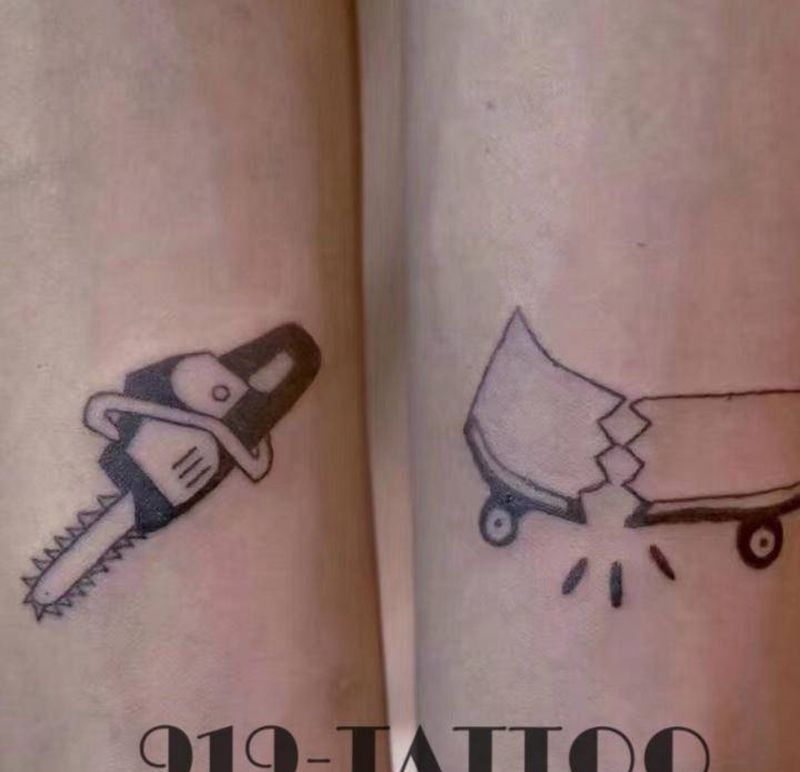滑板-电锯纹身图片_手臂纹身图案