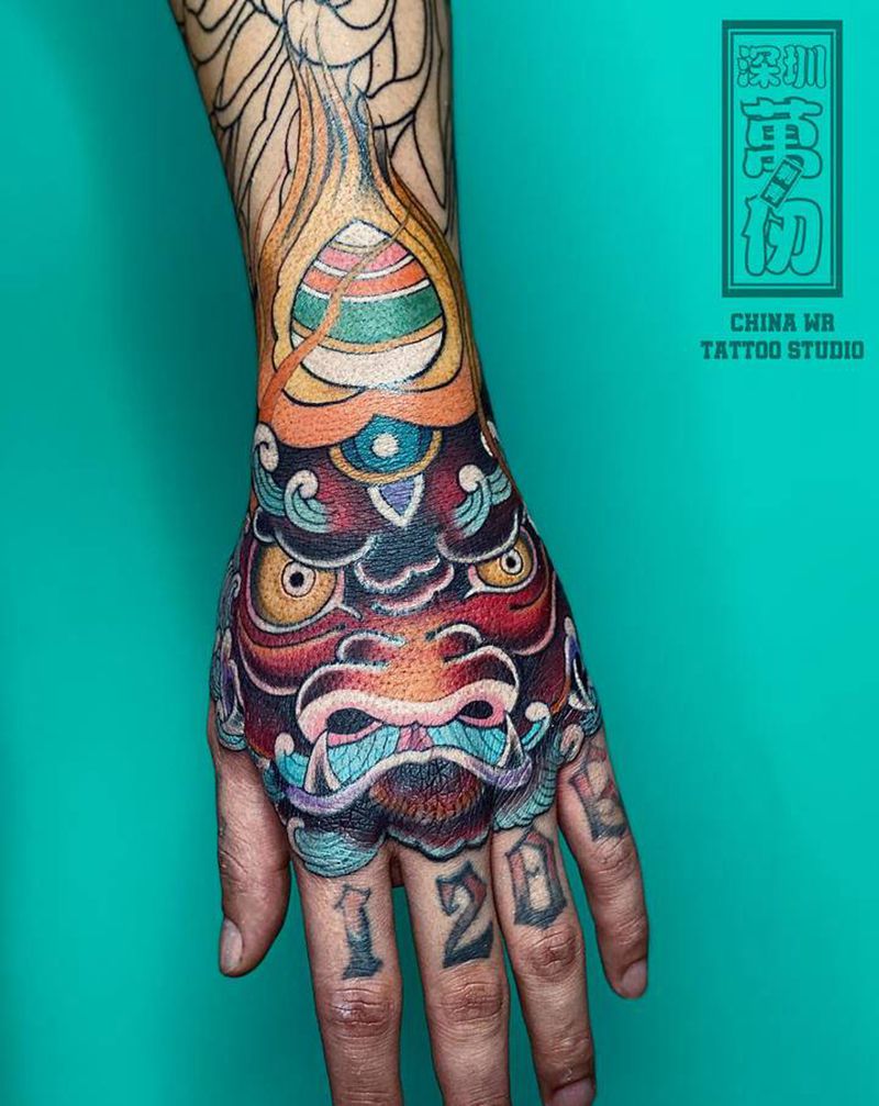 手背 唐狮纹身图片_手部新传统纹身图案