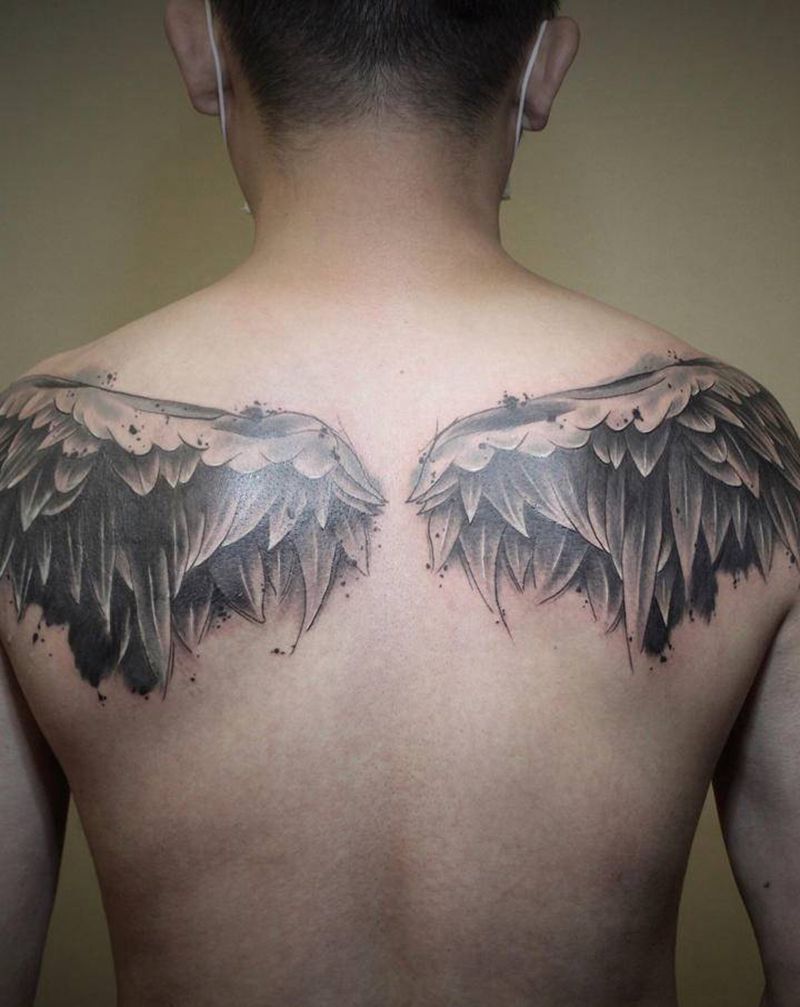 翅膀遮盖纹身图片_水墨欧美写实纹身图案