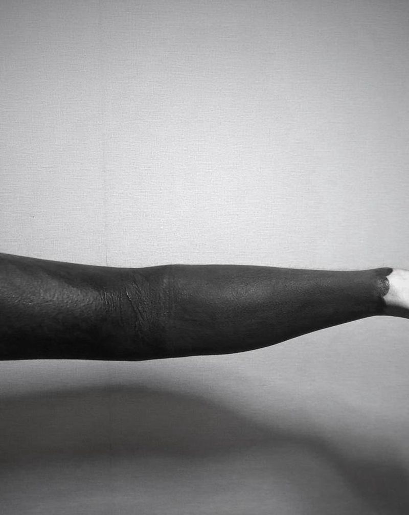 黑臂纹身图片_手部手臂欧美写实图腾花臂纹身图案