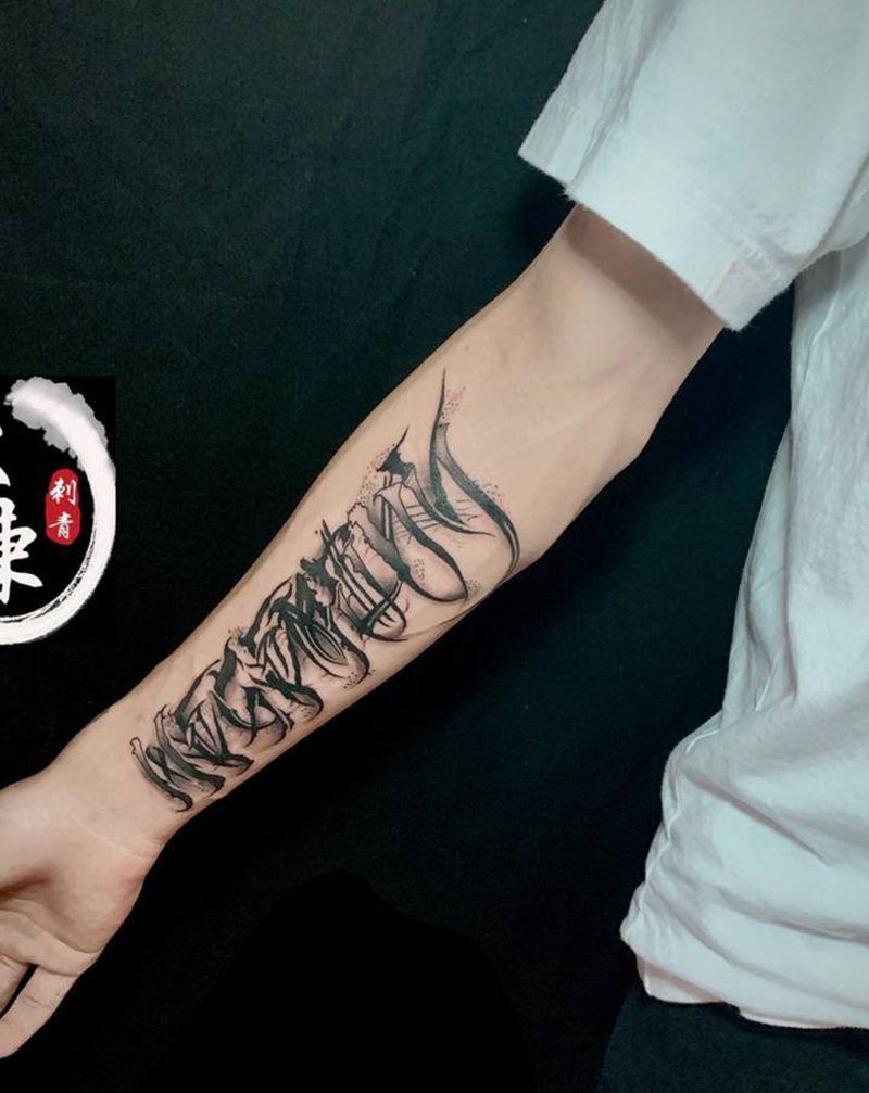 花体纹身图片_手臂花体字图腾纹身图案