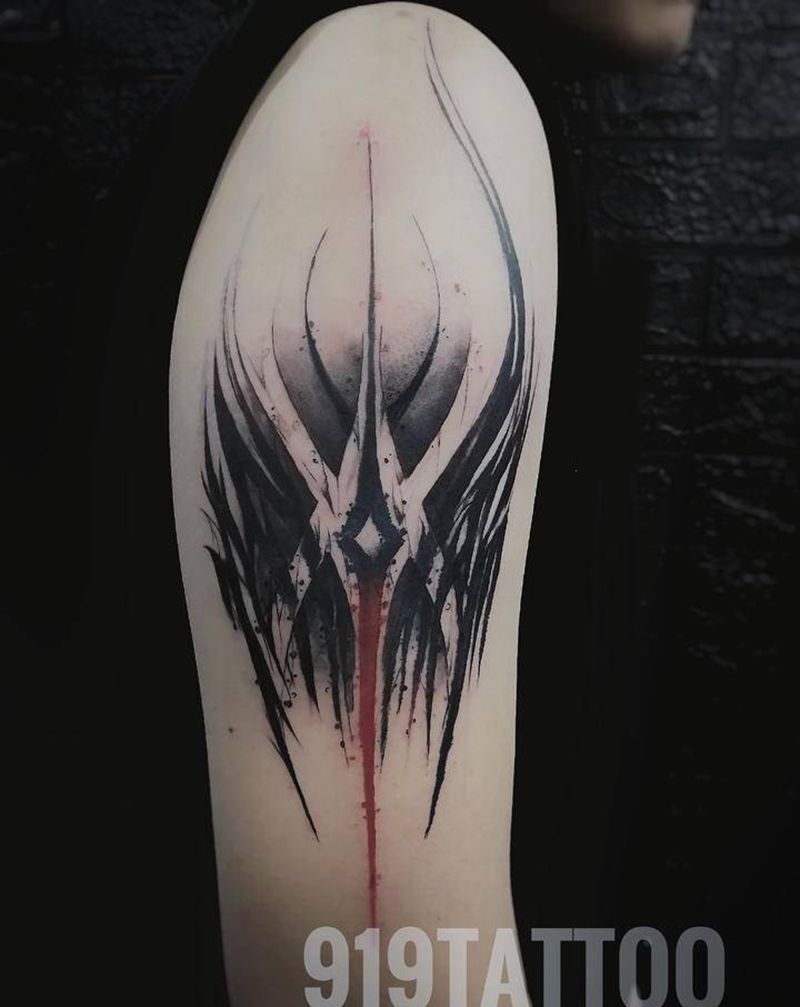 X纹身图片_手臂花体字暗黑风格纹身图案