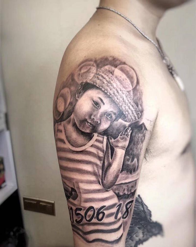 父亲的小棉袄纹身图片_手臂欧美写实纹身图案