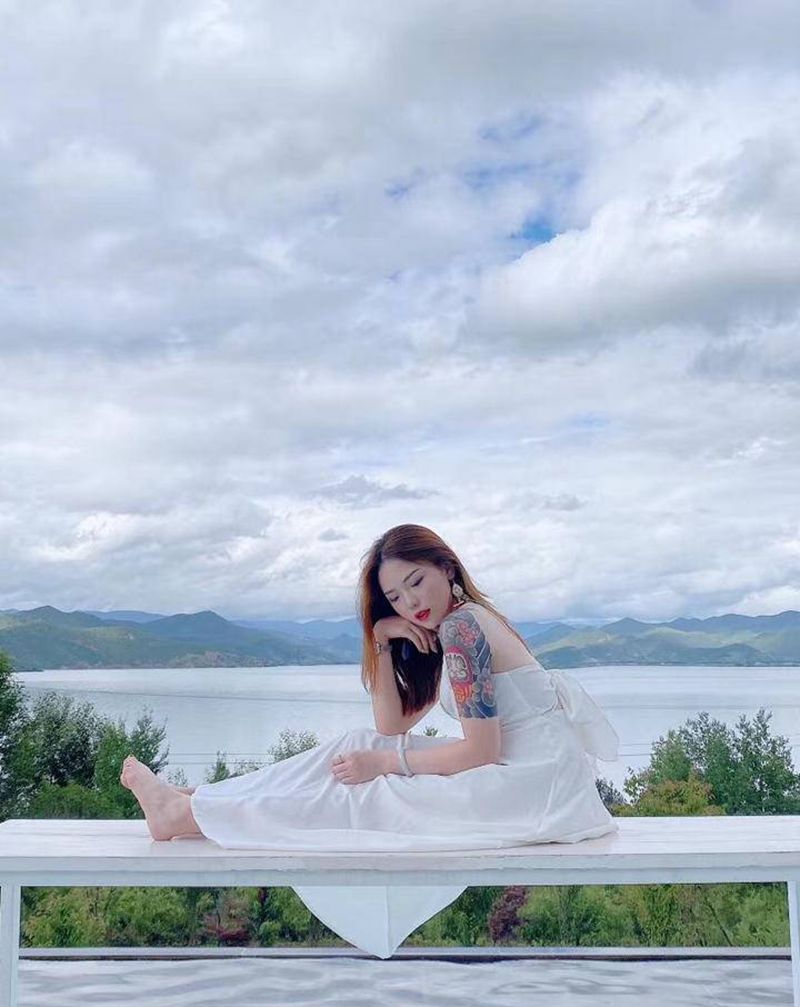 传统达摩蛋包大臂纹身图片_手臂老传统纹身图案