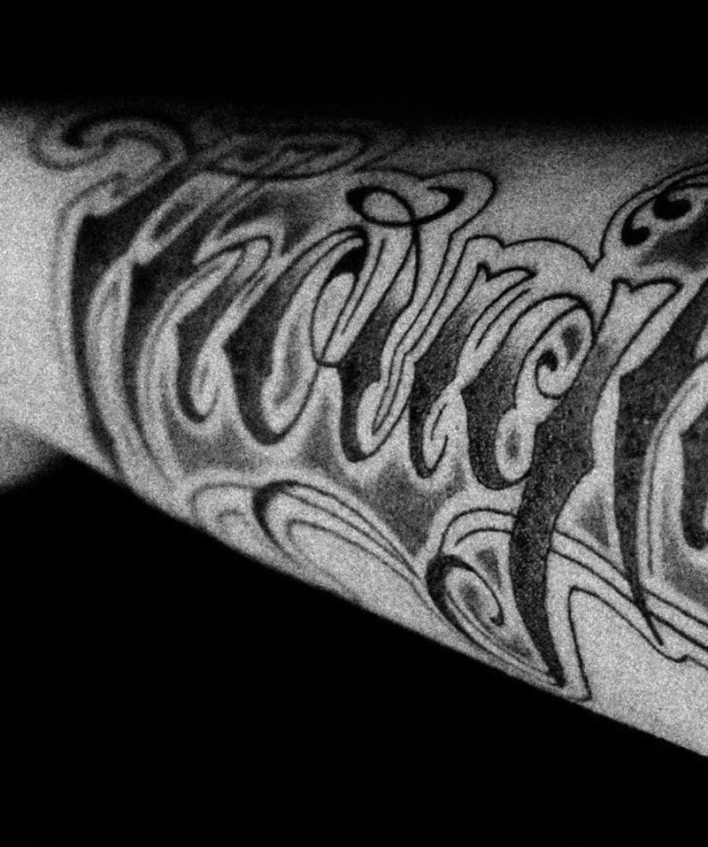 花体字纹身图片_手臂纹身图案