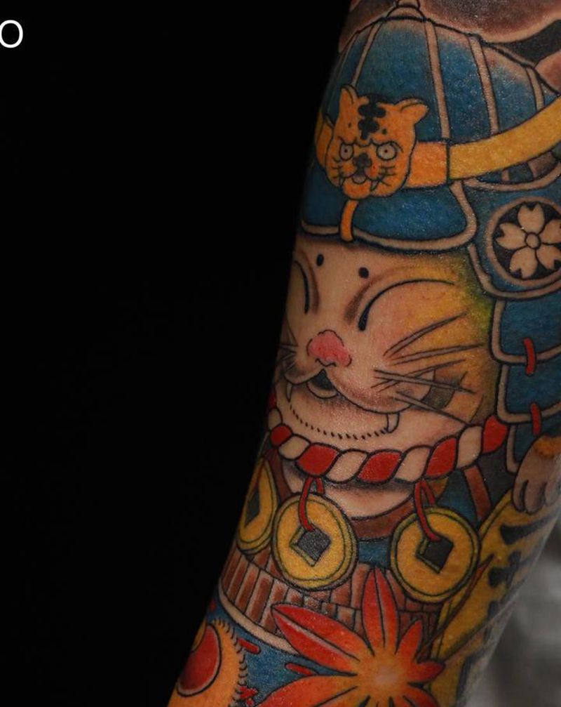 传统武士猫达摩蛋纹身图片_手臂老传统纹身图案
