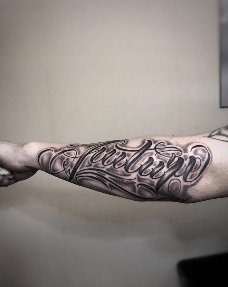 花体字纹身图片_手臂花体字纹身图案