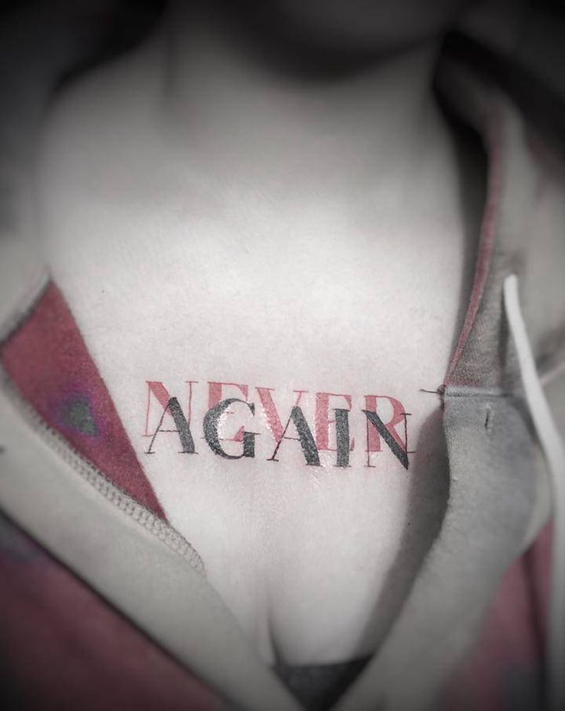 字母纹身图片_胸部图腾几何纹身图案