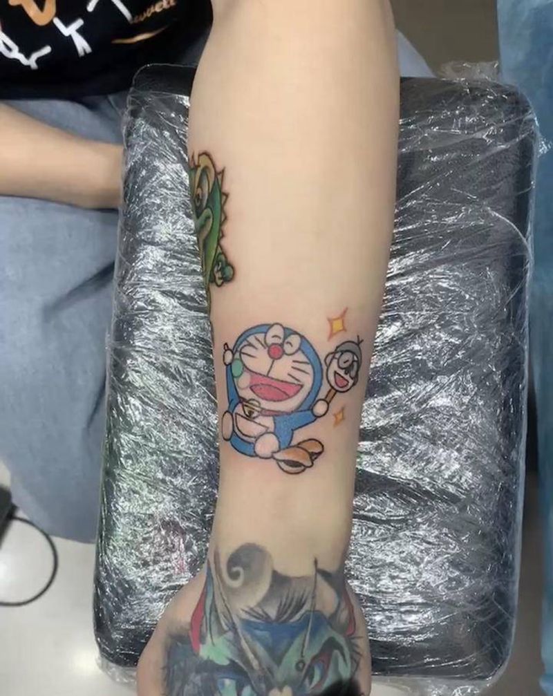 哆啦A梦纹身图片_手臂纹身图案