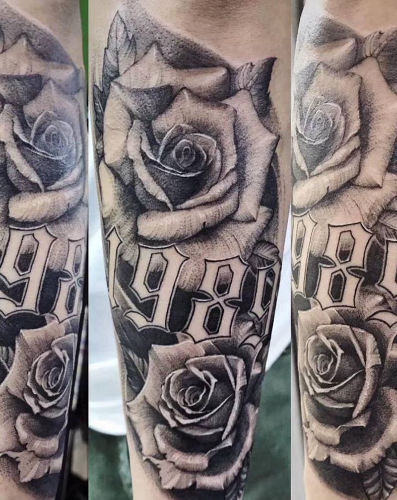 玫瑰纹身图片_手臂点刺欧美写实纹身图案