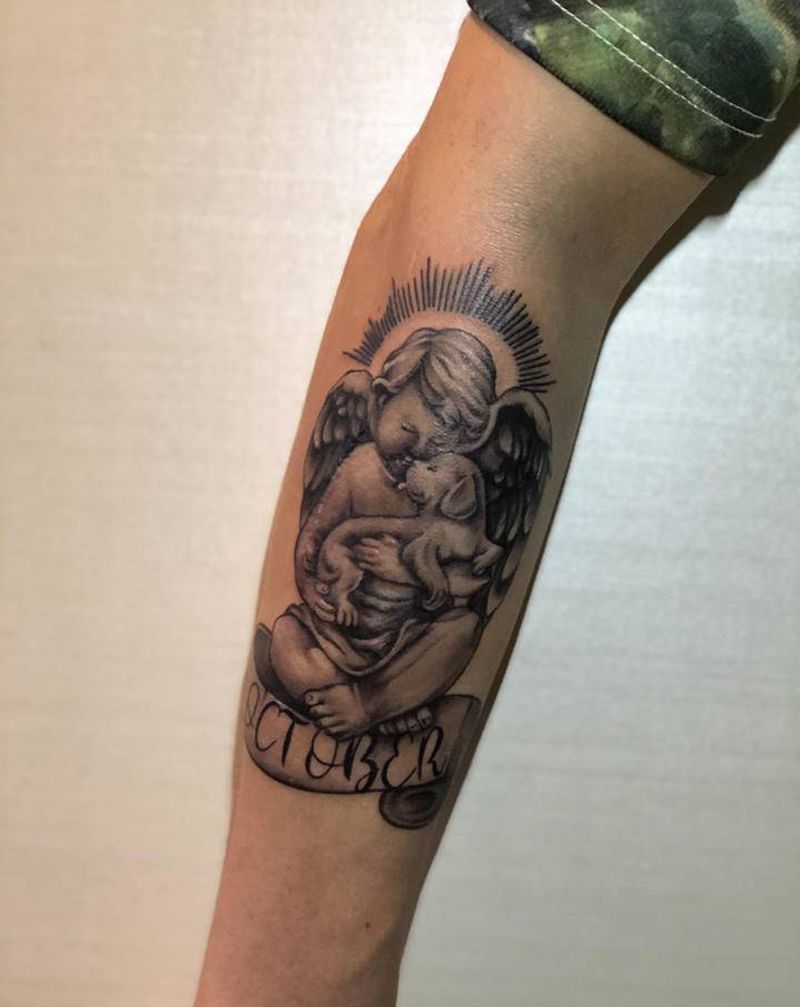 天使与爱宠物纹身图片_手臂纹身图案