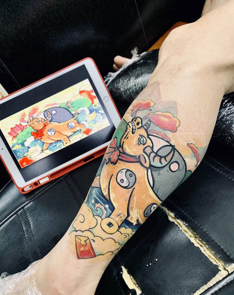 牛气冲天纹身图片_腿部纹身图案