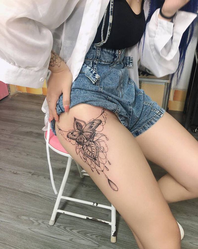 大腿蝴蝶纹身图片_腿部几何纹身图案