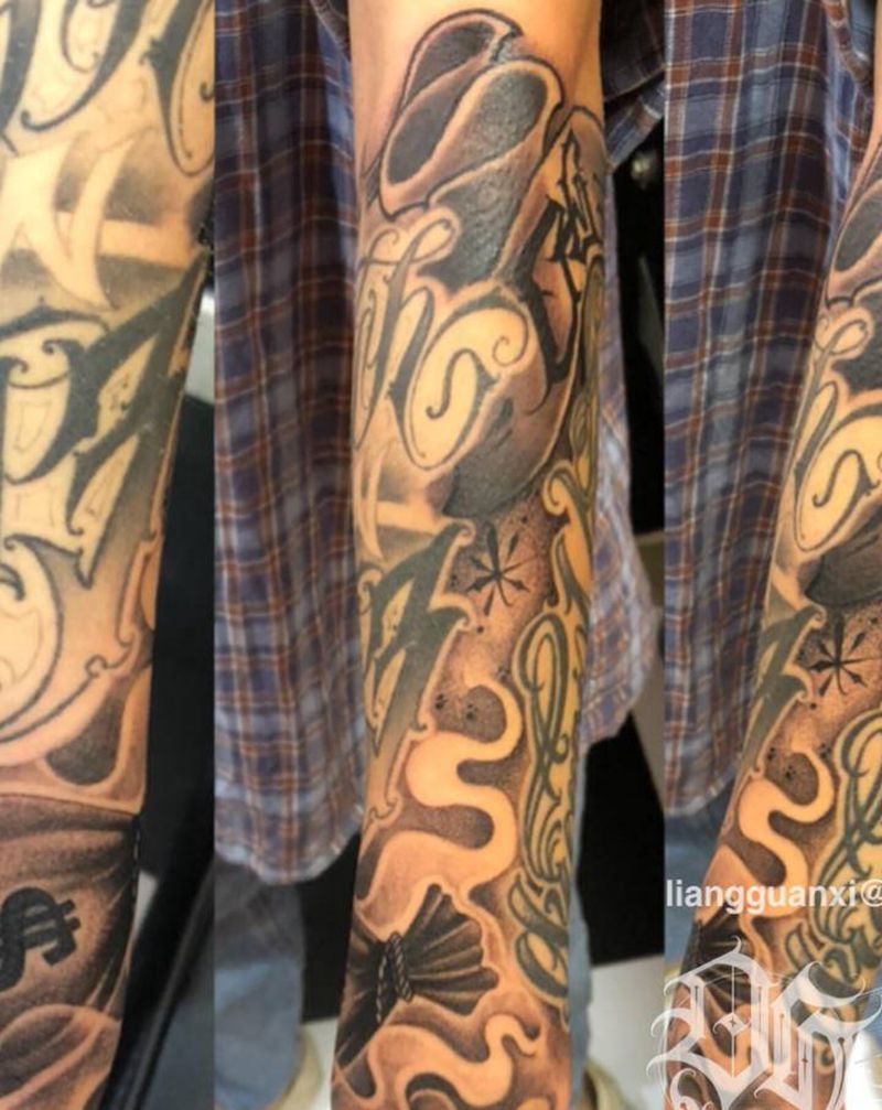 。纹身图片_手臂手部花体字点刺纹身图案