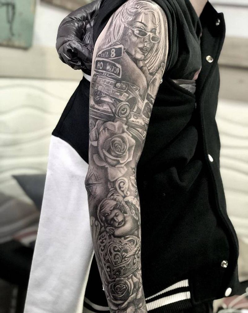 西岸风花臂纹身图片_手臂欧美写实纹身图案