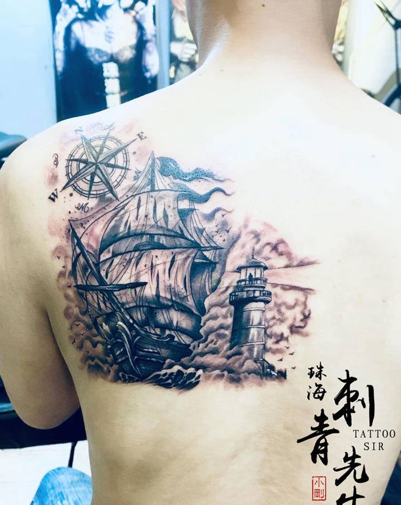帆船指南针灯塔纹身图片_背部欧美写实纹身图案