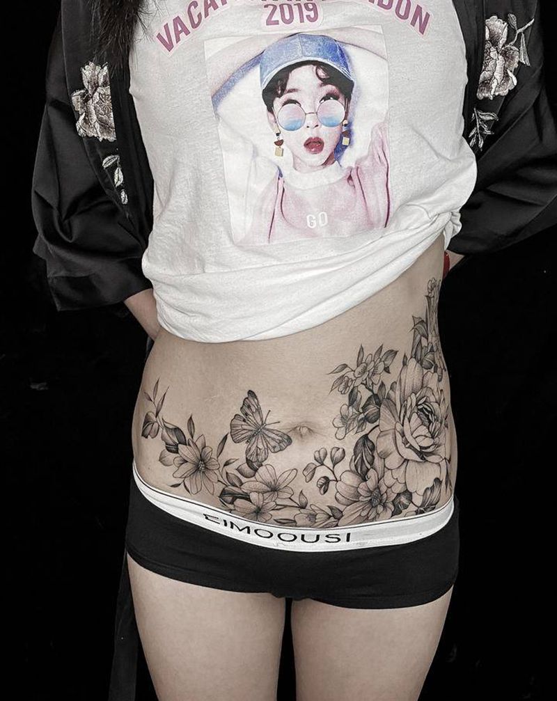 素花纹身图片_腹部点刺纹身图案