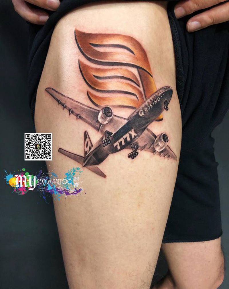 飞机波音777X纹身图片_腿部欧美写实纹身图案