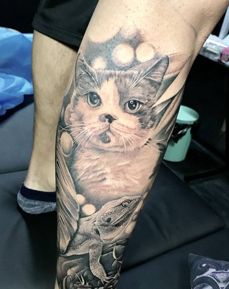 猫与蜥蜴纹身图片_腿部欧美写实纹身图案