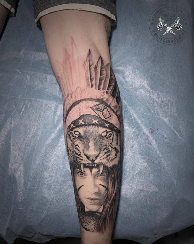 写实脑斧纹身图片_腿部纹身图案