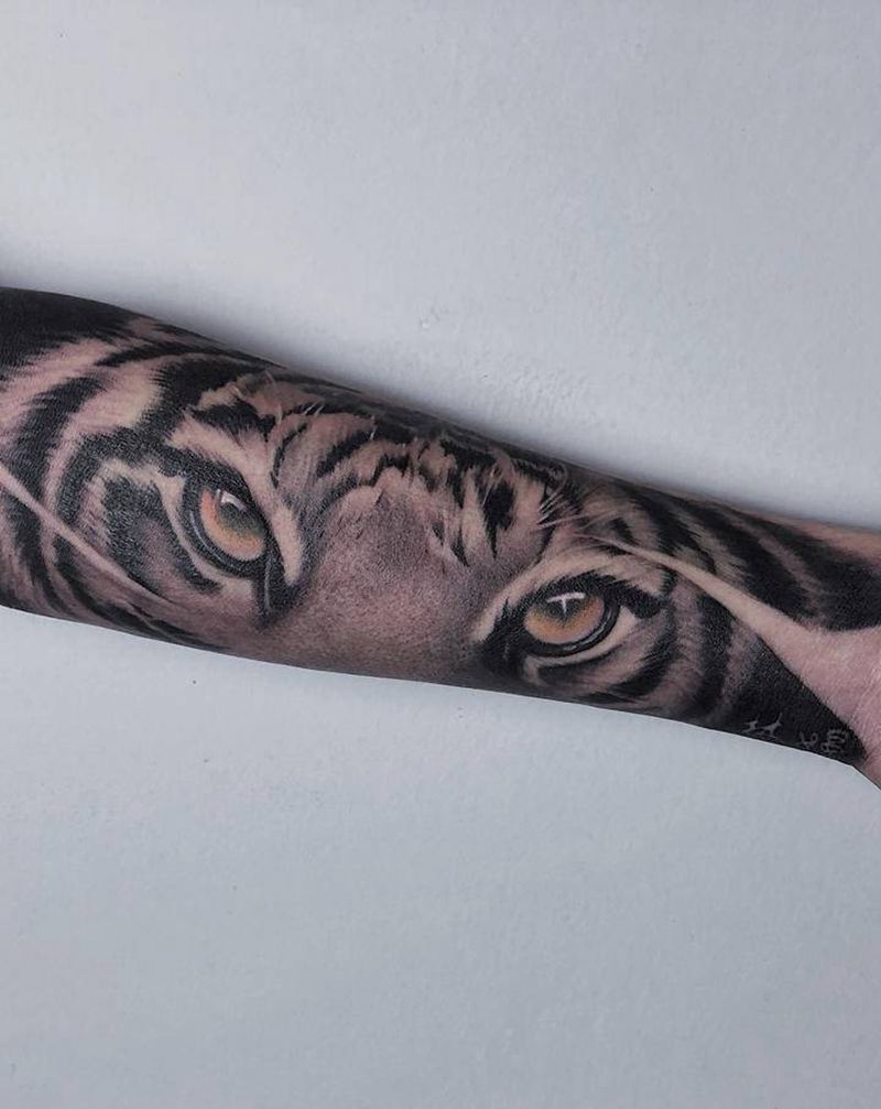 虎眼纹身图片_手臂纹身图案