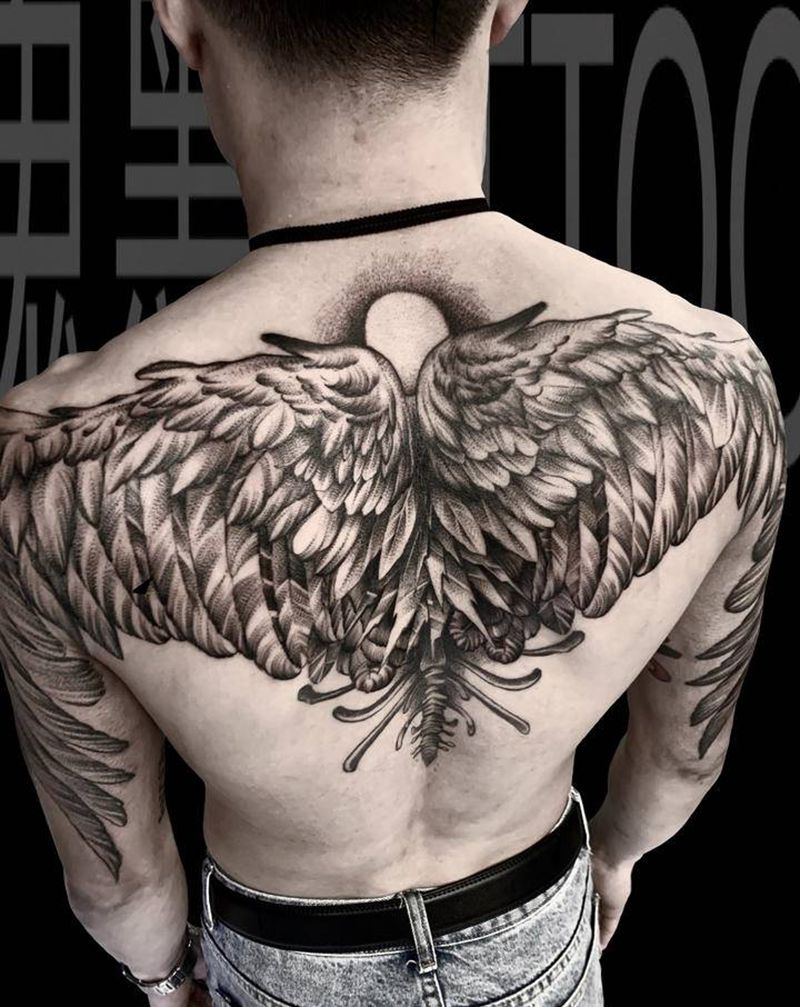 点刺半背翅膀纹身图片_背部点刺纹身图案